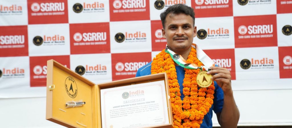 Uttam Agrahari, a yoga student of SGRR University, made a national record in Tadasana